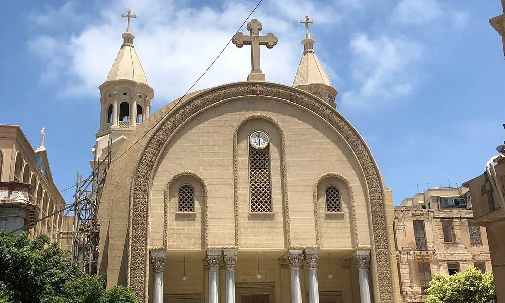 The twin bell towers of a Coptic Orthodox cathedral in Alexandria