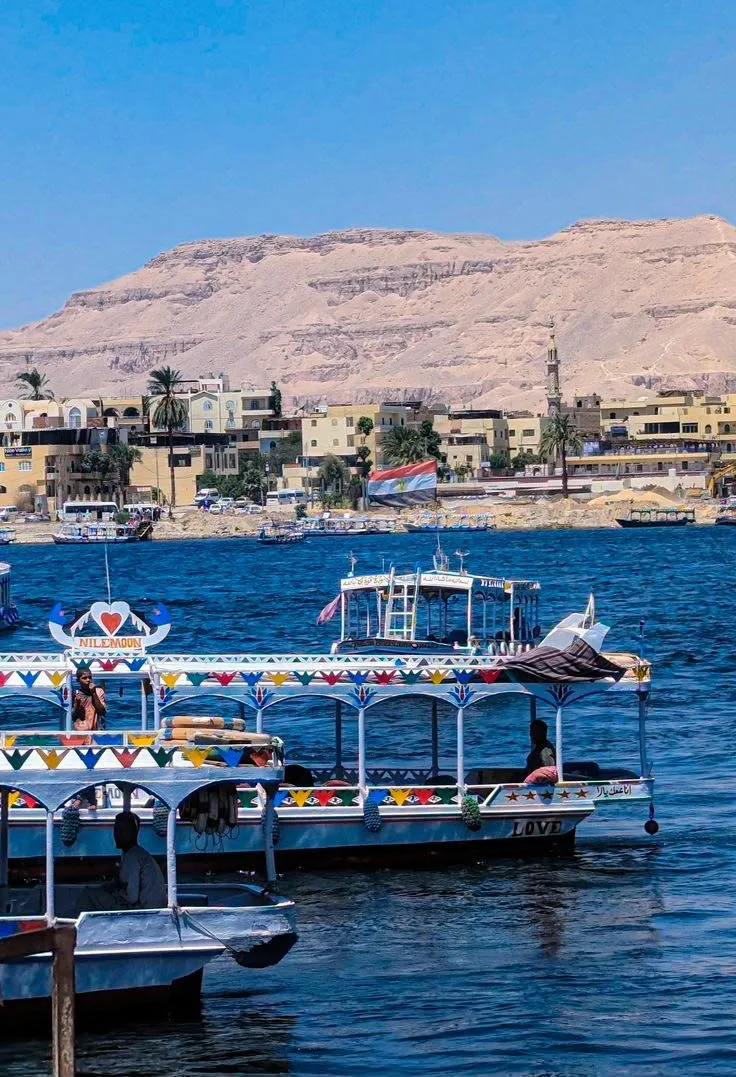 Brightly decorated Nubian boats moored on the Nile at Aswan