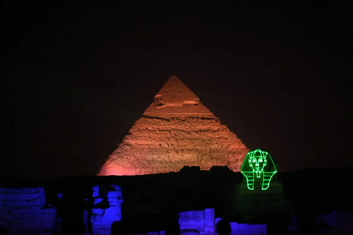 The Sound and Light show illuminating the Pyramids of Giza after dark