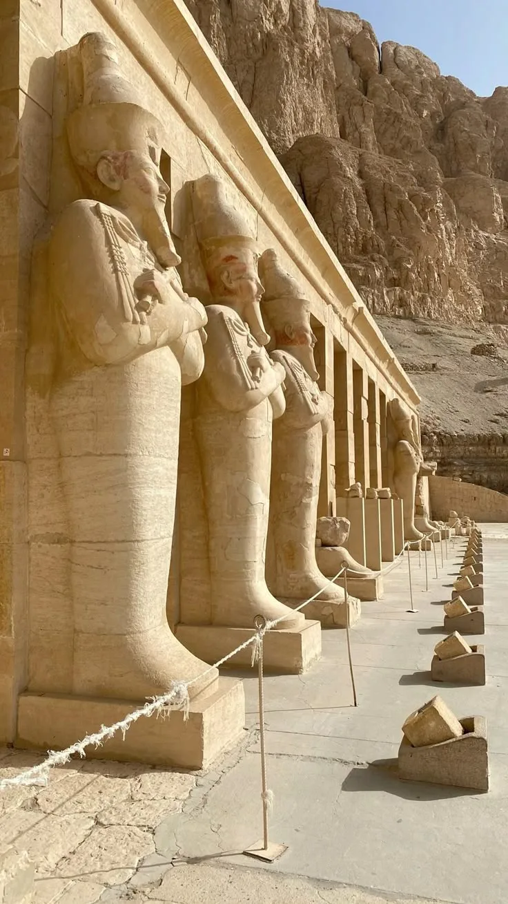 Osiride statues of Hatshepsut on the upper terrace of her temple at Deir el-Bahri